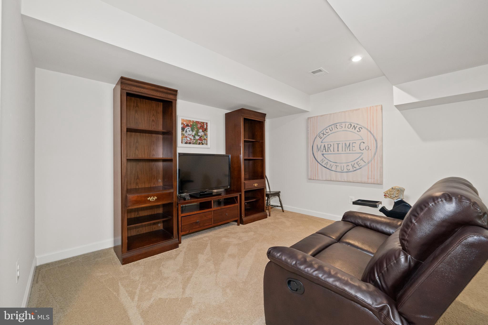 355 Dillon Circle Middletown, DE 19709 - Photo 50 of 84 a living room with furniture and a flat screen tv