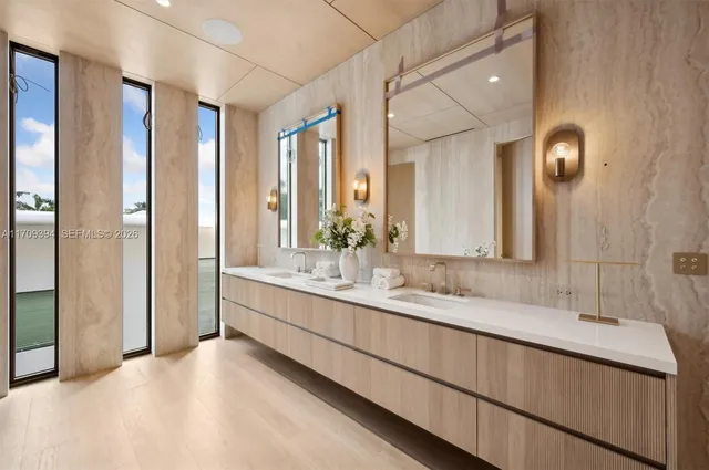 a bedroom with a bed and a mirror