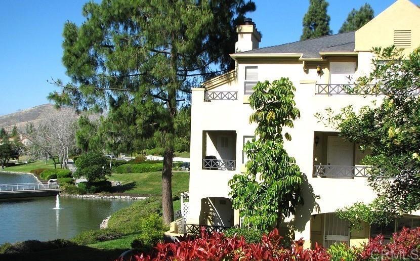 795 Brookstone Road, Unit 202 Chula Vista, CA 91913 - Photo 1 of 1 front view of house with a yard and potted plants