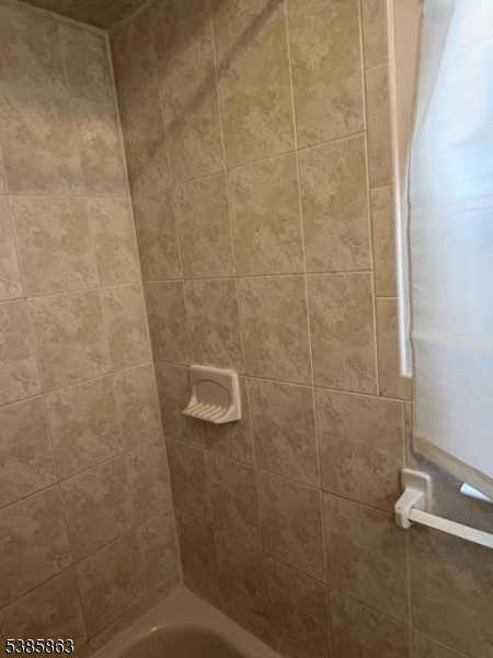 45 2nd Street Newark, NJ 07107 - Photo 13 of 32 a bathroom with a shower