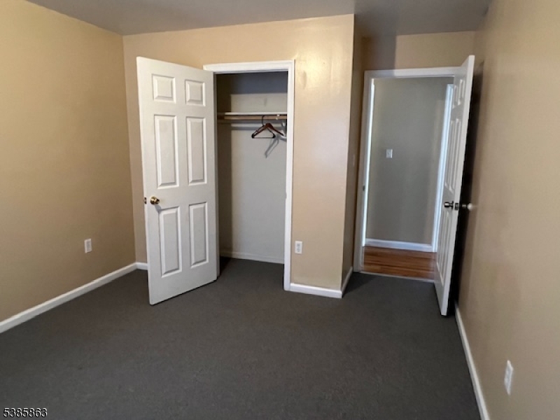 45 2nd Street Newark, NJ 07107 - Photo 17 of 32 an empty room with closet area