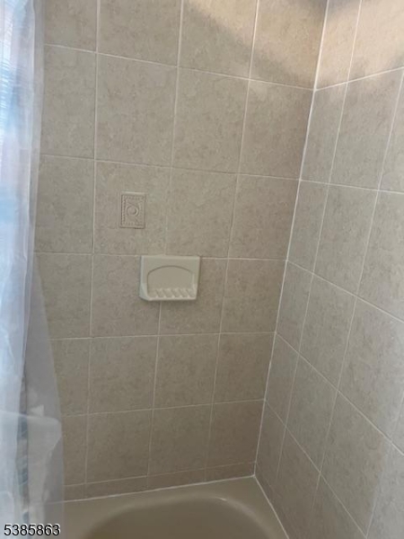 45 2nd Street Newark, NJ 07107 - Photo 23 of 32 a bathroom with a shower