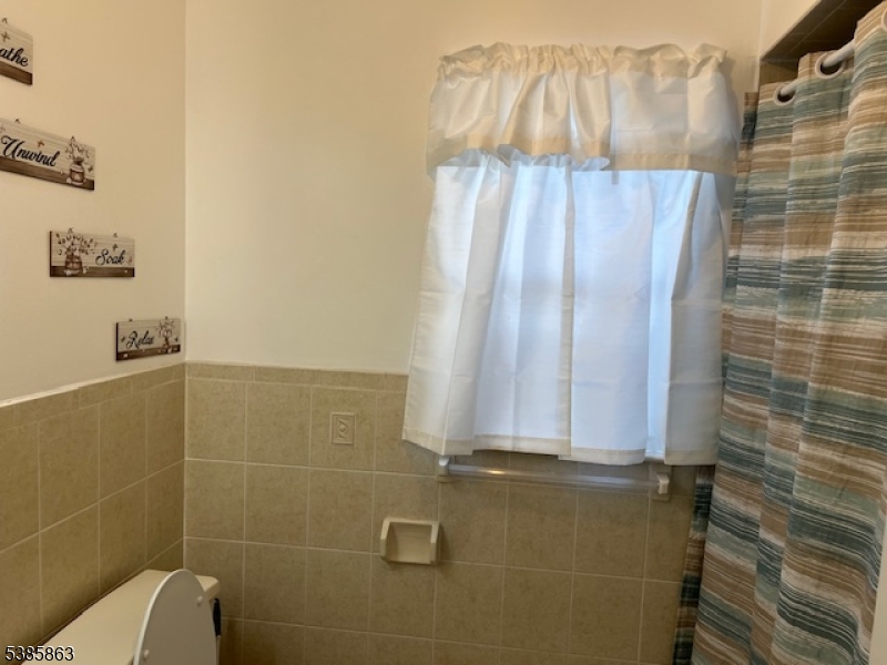 45 2nd Street Newark, NJ 07107 - Photo 26 of 32 a bathroom with a shower