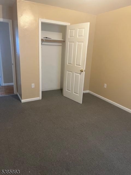 45 2nd Street Newark, NJ 07107 - Photo 29 of 32 an empty room with windows