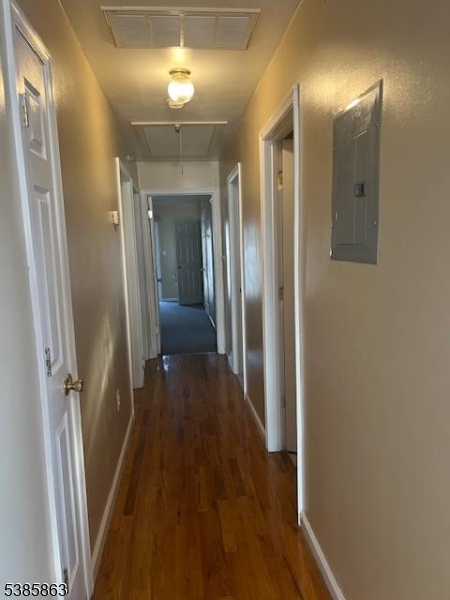 45 2nd Street Newark, NJ 07107 - Photo 9 of 32 a view of a hallway with wooden floor