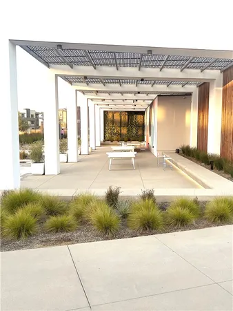a view of a swimming pool and a yard