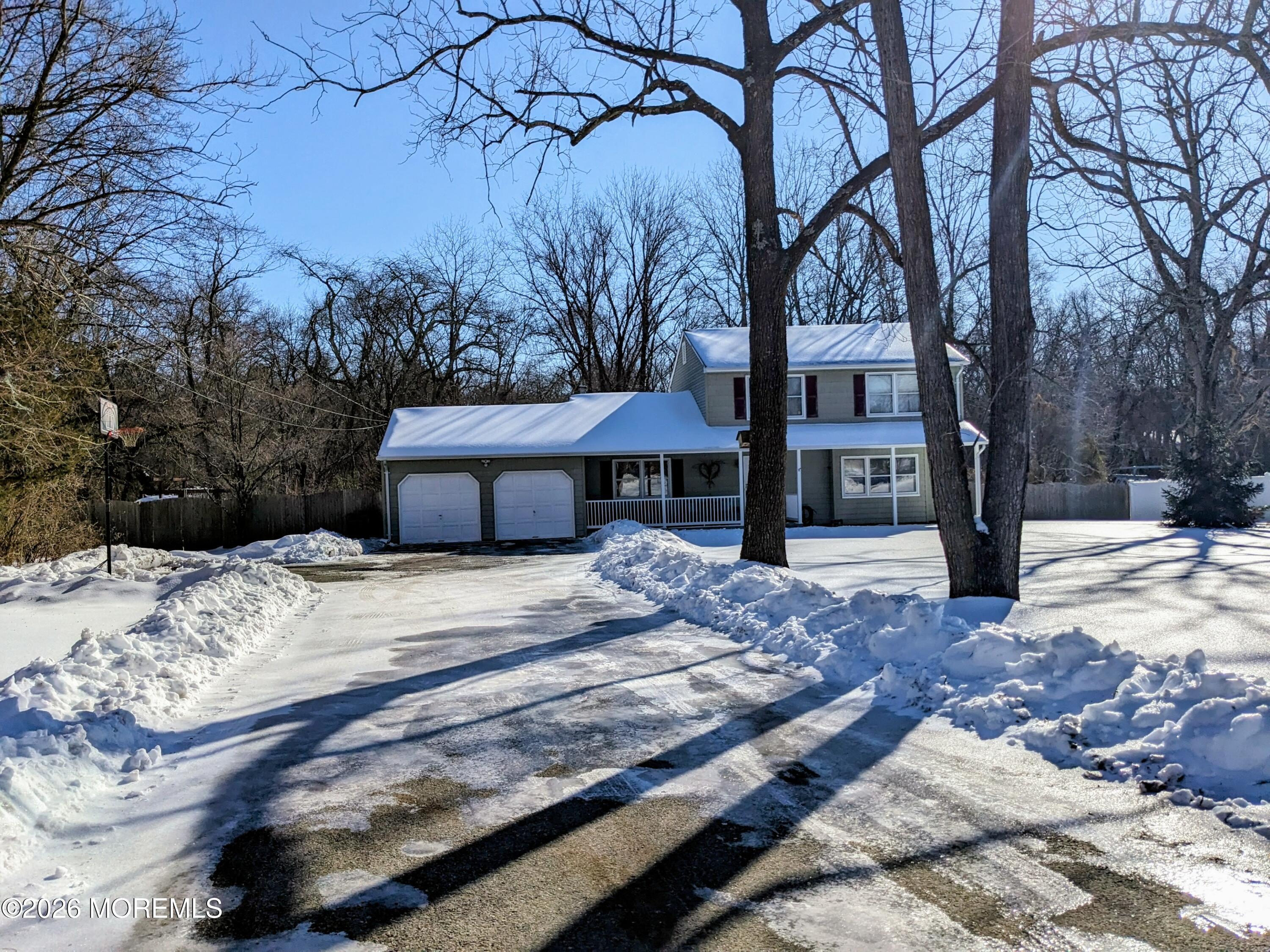 a house with trees in front of it