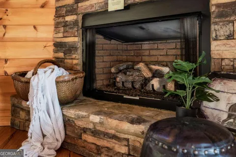 a kitchen with stove and cabinets