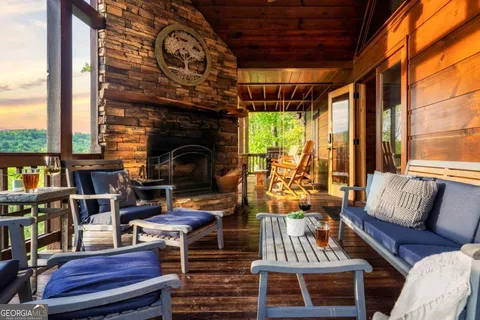 a bedroom with bed and wooden floor