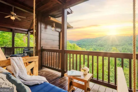 a bathroom with a granite countertop sink and a window