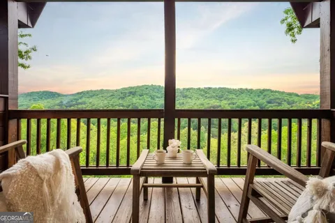 a backyard of a house with lots of green space and garden