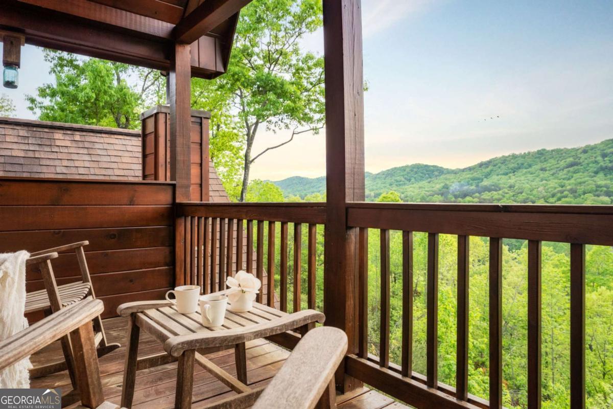273 Deer Crest Heights Blue Ridge, GA 30513 - Photo 49 of 73 a view of a balcony with chairs
