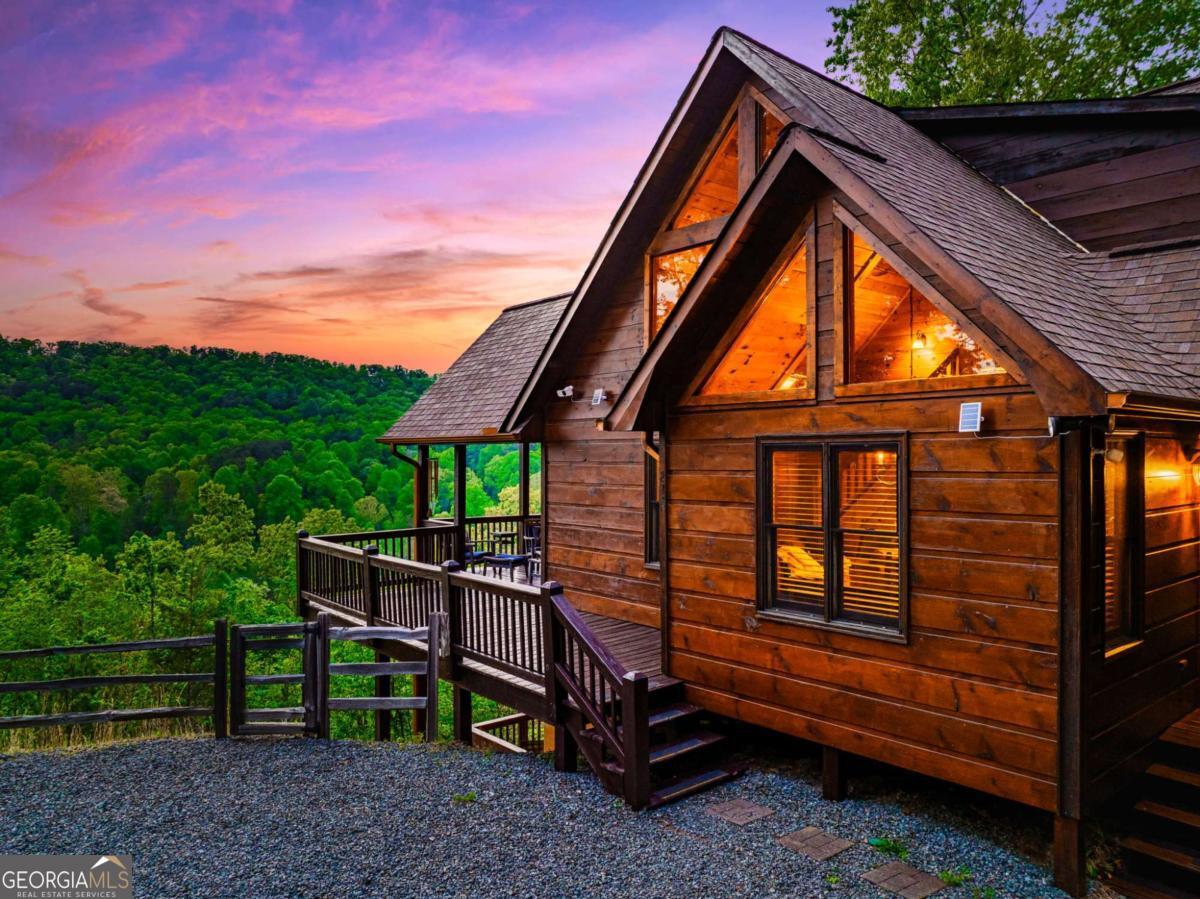 273 Deer Crest Heights Blue Ridge, GA 30513 - Photo 8 of 73 a backyard of a house with lots of green space
