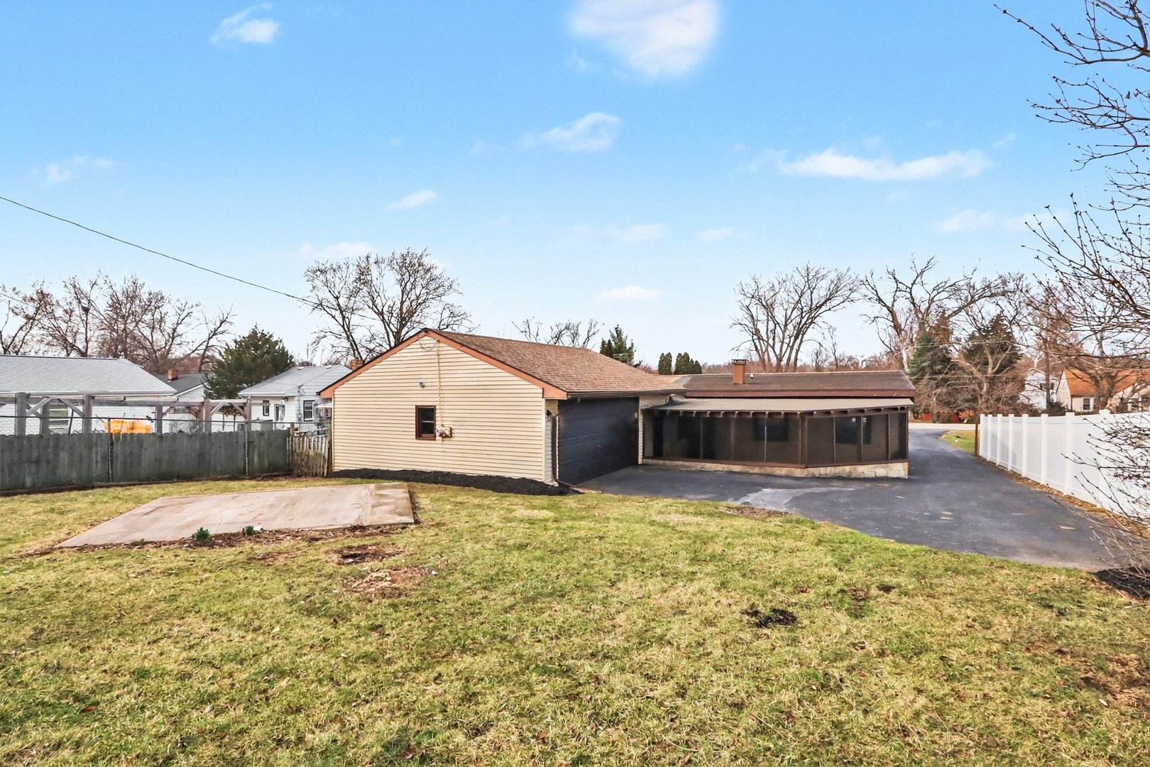 629 Thornton Street Lockport, IL 60441 - Photo 15 of 15 a front view of a house with a yard and garage
