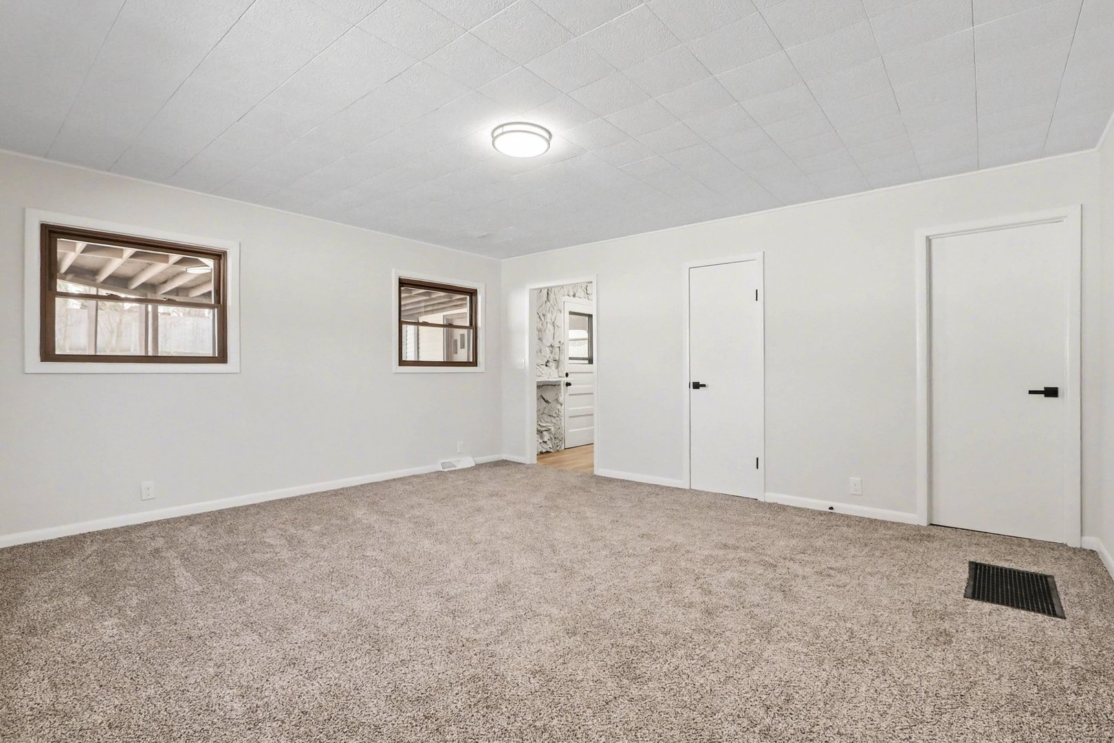 629 Thornton Street Lockport, IL 60441 - Photo 3 of 15 an empty room with windows