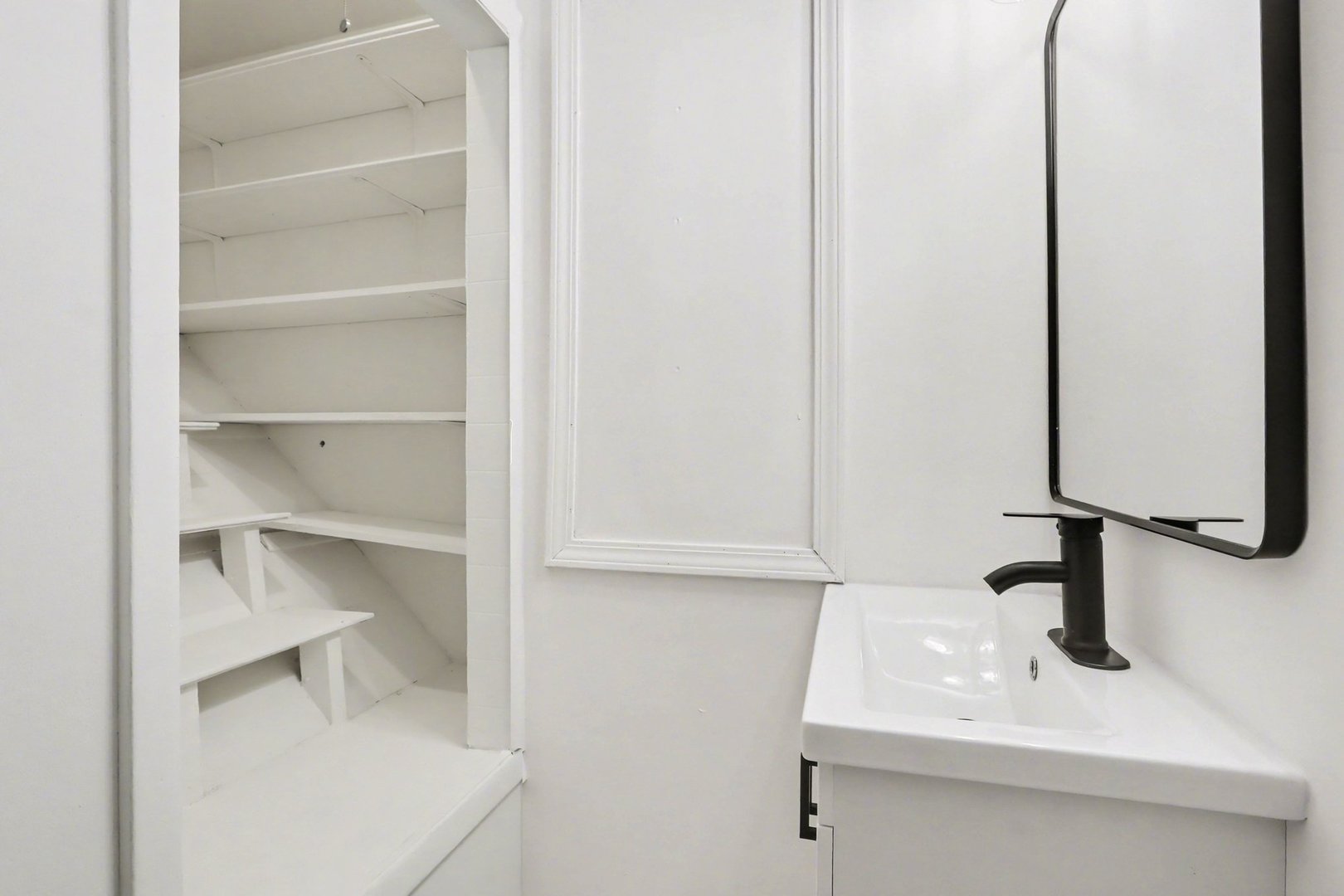 629 Thornton Street Lockport, IL 60441 - Photo 8 of 15 a bathroom with a sink and a mirror