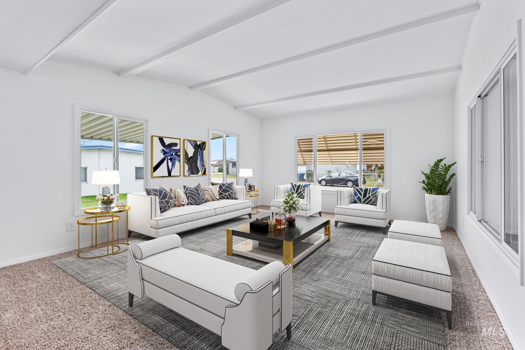 358 Bonanza Street Boise, ID 83713 - Photo 12 of 25 Carpeted living area with baseboards