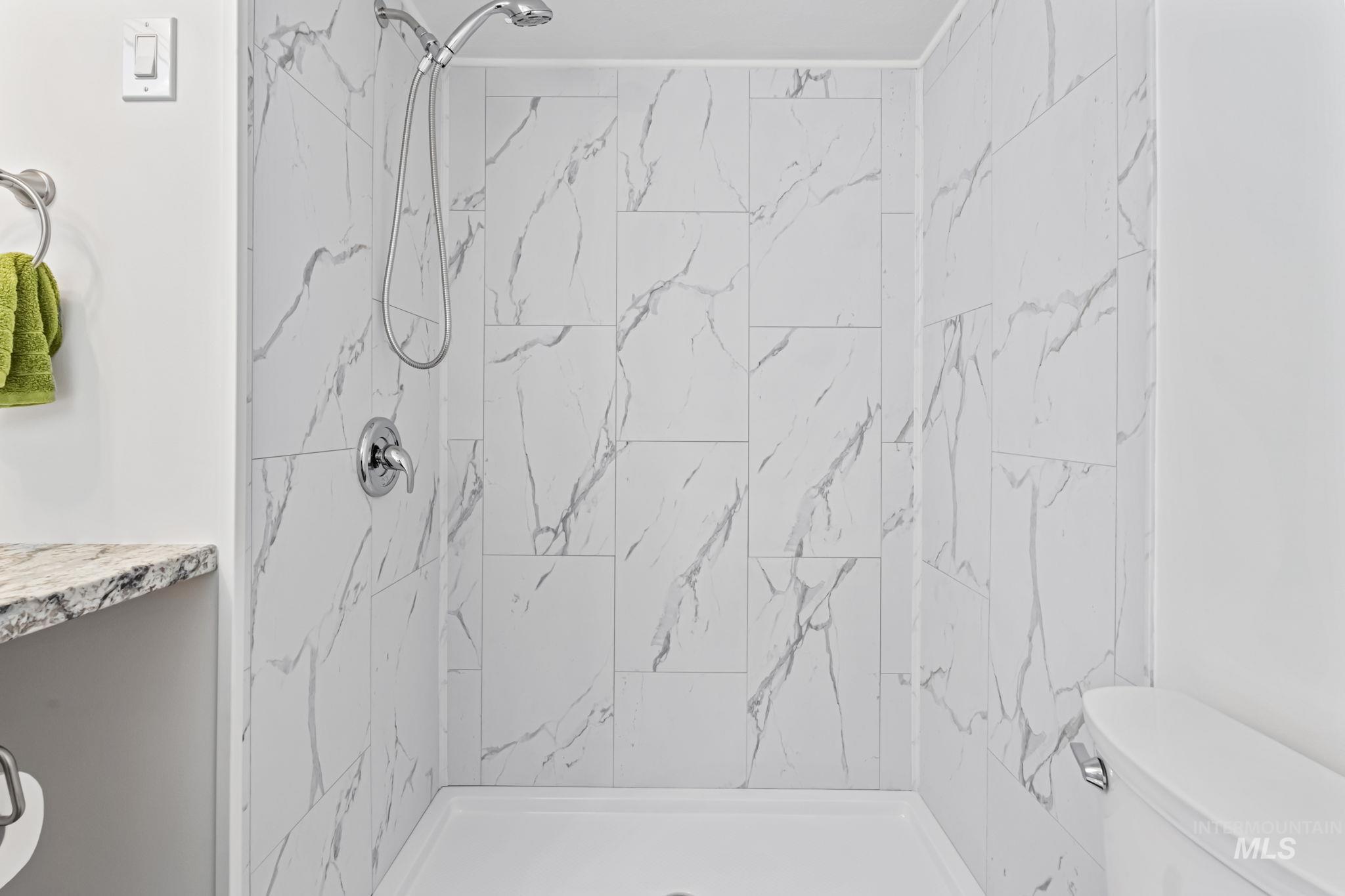 358 Bonanza Street Boise, ID 83713 - Photo 19 of 25 Bathroom with a marble finish shower