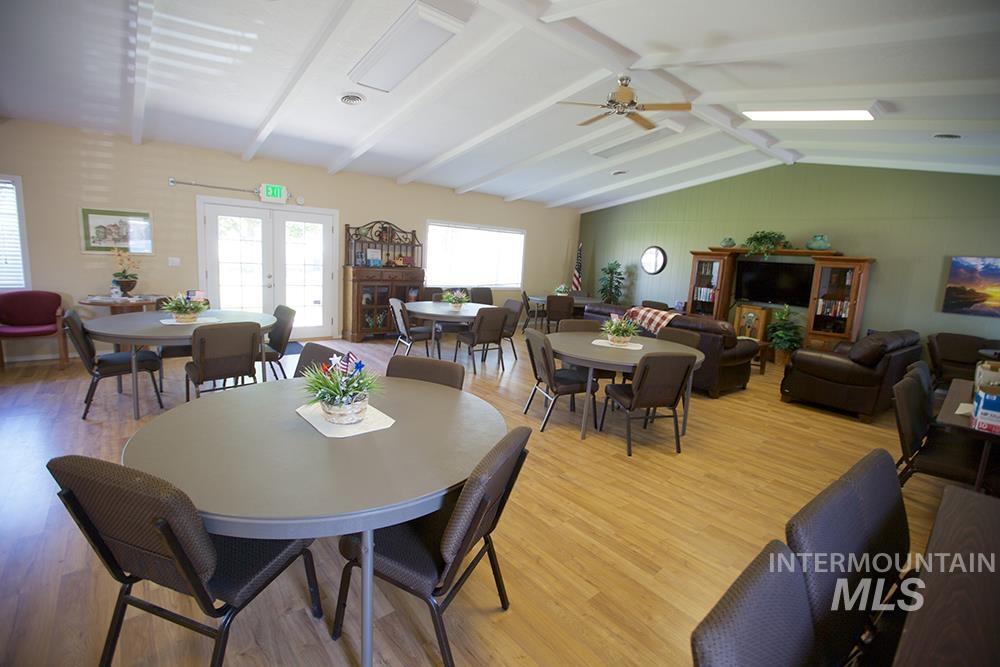 358 Bonanza Street Boise, ID 83713 - Photo 24 of 25 Dining space with french doors, wood finished floors, and a ceiling fan