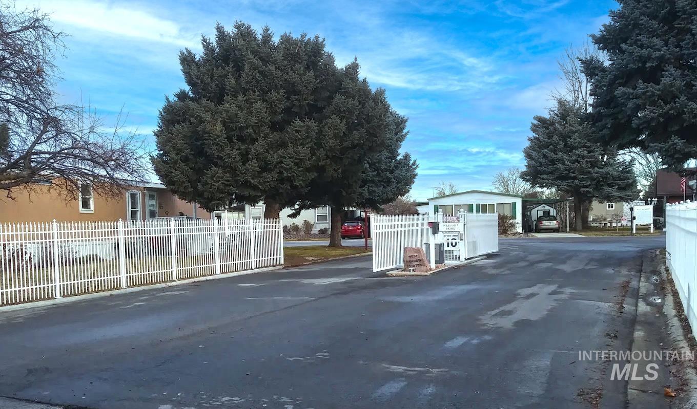 358 Bonanza Street Boise, ID 83713 - Photo 25 of 25 View of asphalt road featuring a residential view and curbs
