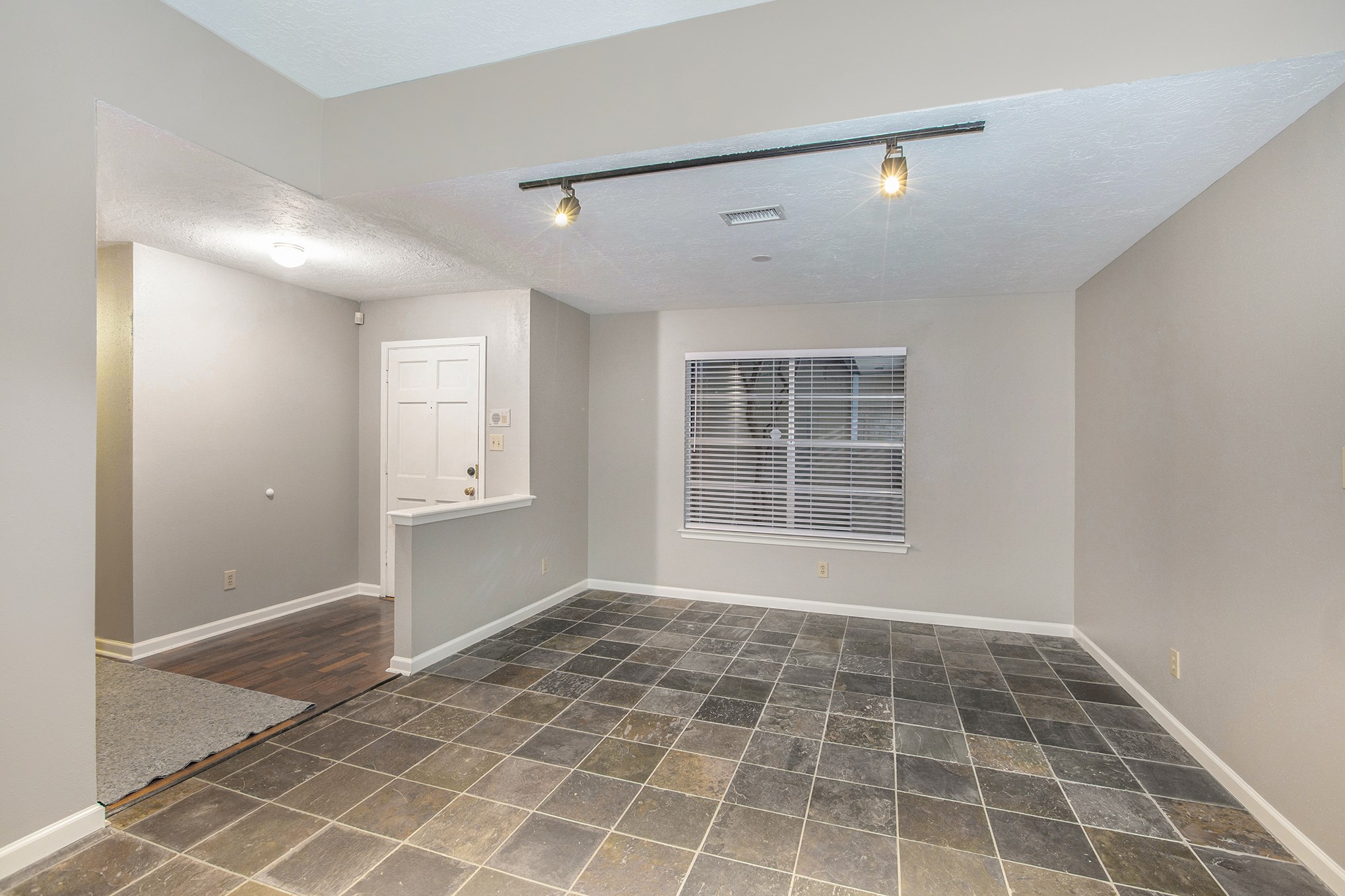 17002 Sky Blue Place Houston, TX 77095 - Photo 6 of 16 a view of an empty room with a window