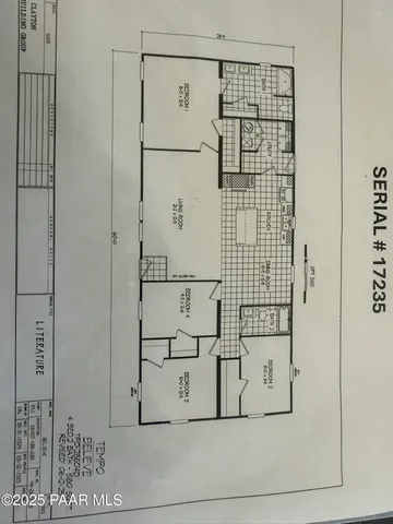 a kitchen with kitchen island sink and refrigerator