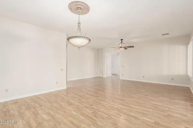 a bathroom with a tub shower and sink