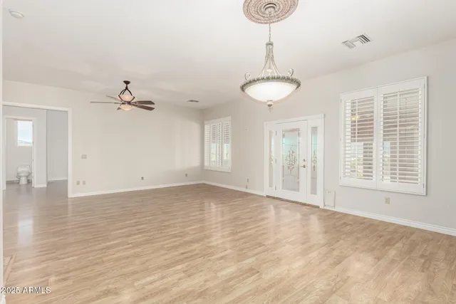 a bathroom with a granite countertop sink a mirror and a