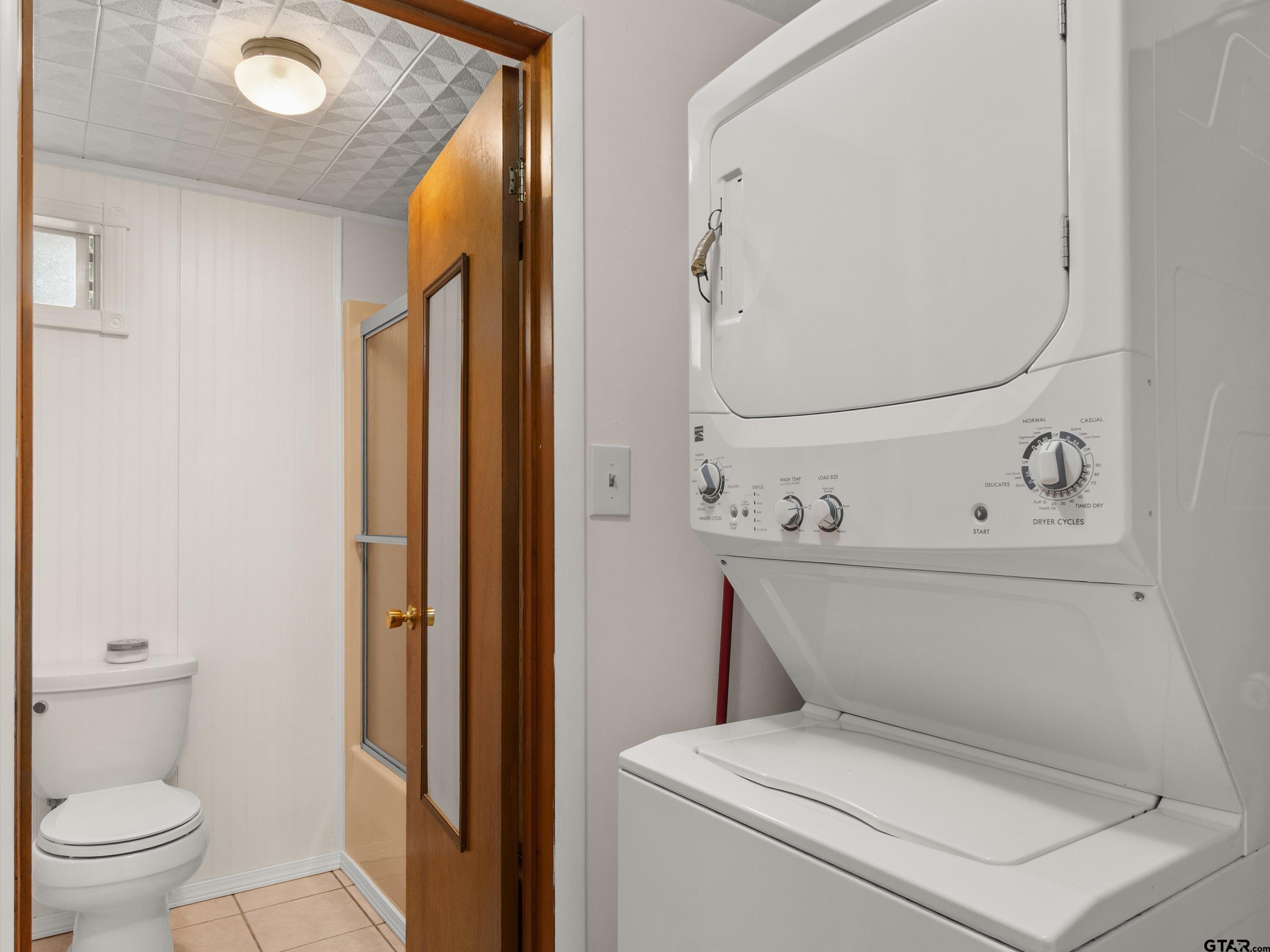 210 Gilbert Street Lone Star, TX 75668 - Photo 12 of 24 a view of bathroom with a toilet and a sink