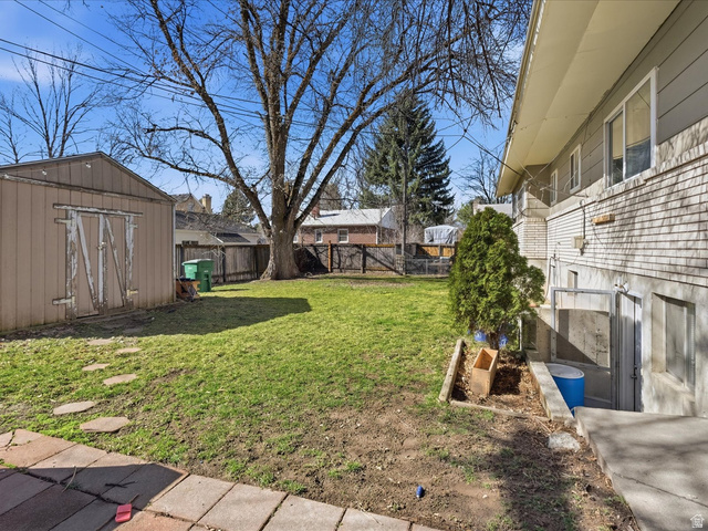 322 East 900 North Logan, UT 84321 - Photo 29 of 43 Fenced backyard featuring a storage shed