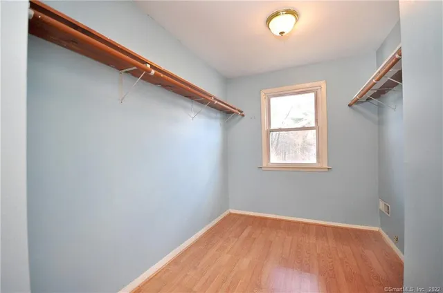 a view of a room that has a window in it