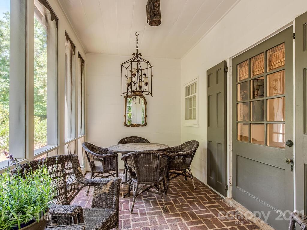 2001 Queens Road East Charlotte, NC 28207 - Photo 11 of 39 a view of a dining room with furniture and window
