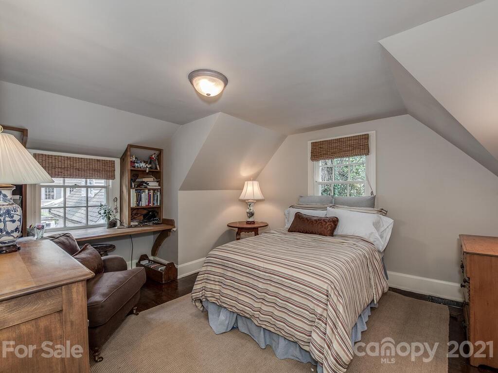 2001 Queens Road East Charlotte, NC 28207 - Photo 29 of 39 a bedroom with furniture a bed and a window