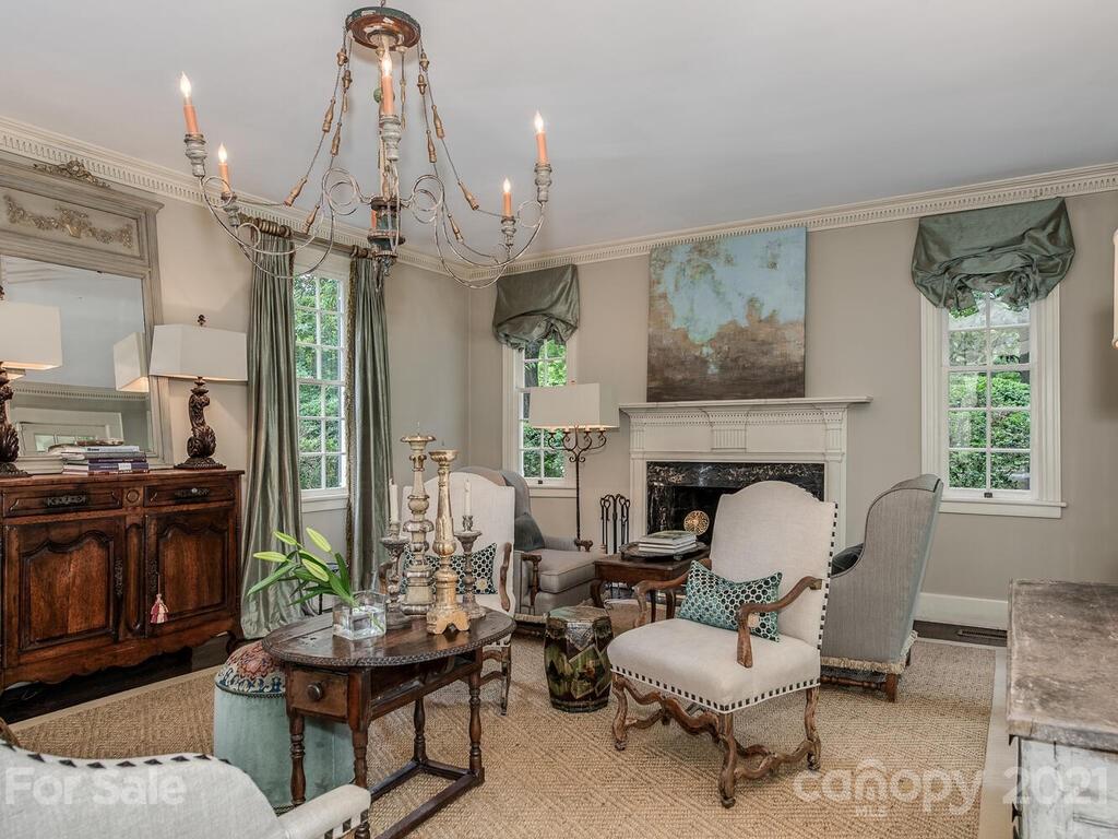 2001 Queens Road East Charlotte, NC 28207 - Photo 7 of 39 a living room with furniture and a fireplace