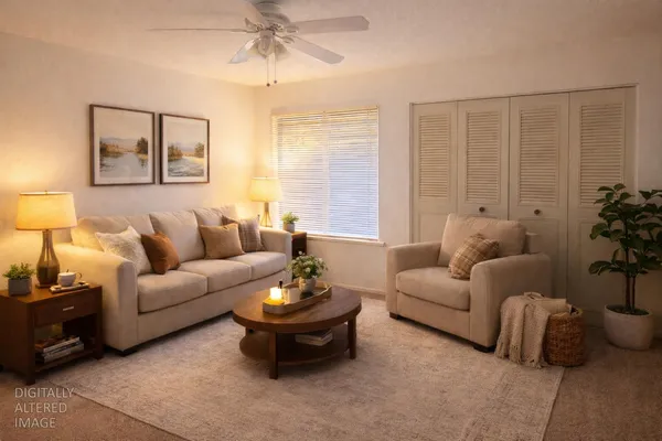 a living room with furniture and a large window