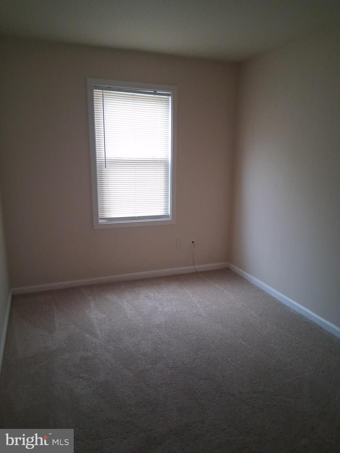 9297 Taney Road Manassas, VA 20110 - Photo 7 of 9 an empty room with a window