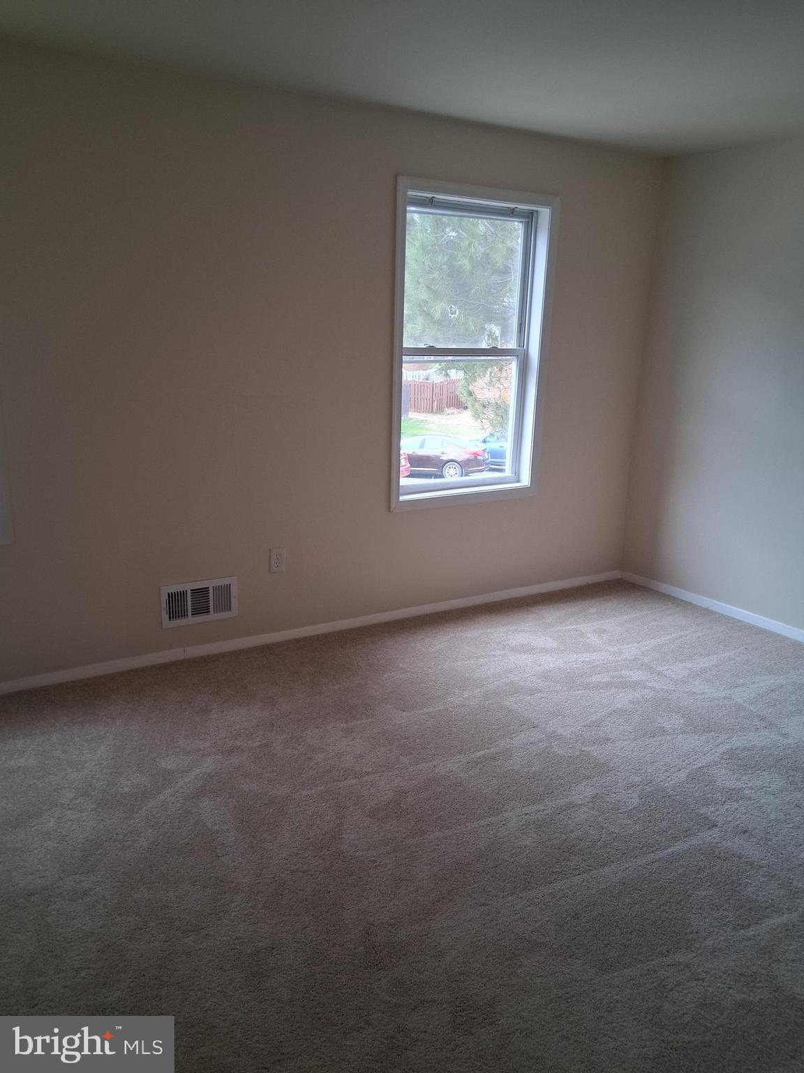 9297 Taney Road Manassas, VA 20110 - Photo 8 of 9 an empty room with a window