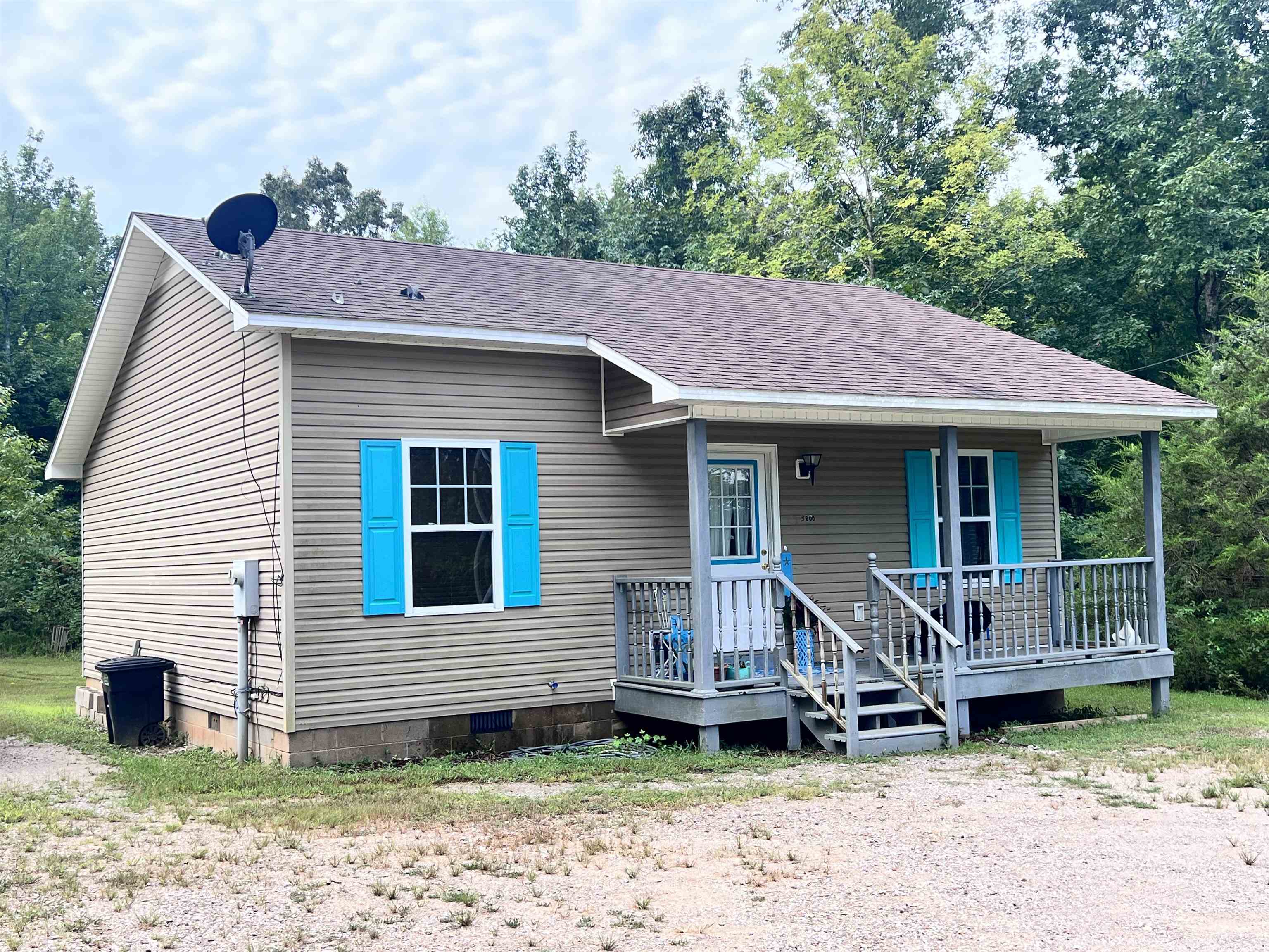 3800 County Home Road Savannah, TN 38372 - Photo 1 of 21 View of front facade with a shingled roof, crawl space, and a porch