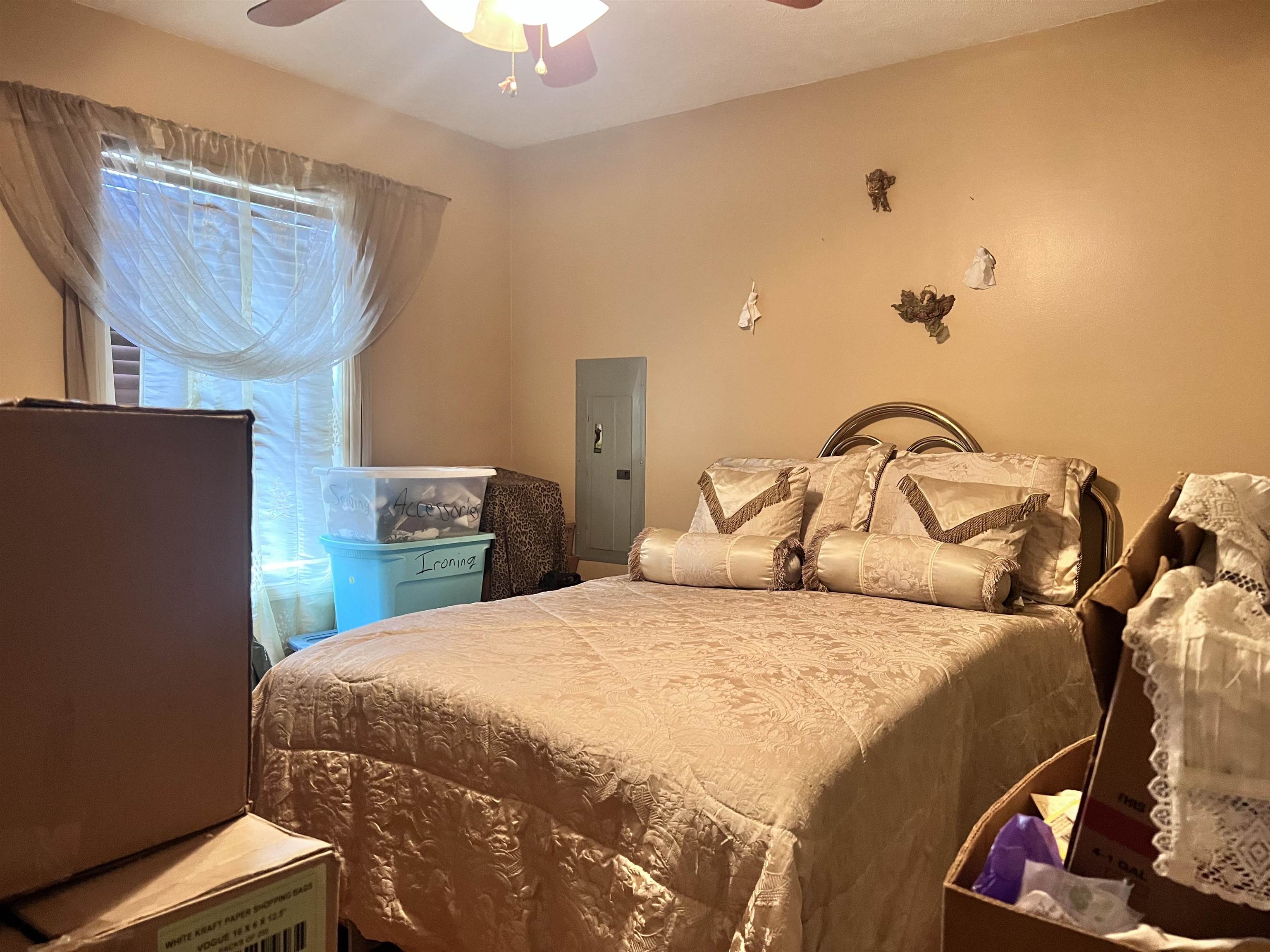 3800 County Home Road Savannah, TN 38372 - Photo 12 of 21 Bedroom featuring ceiling fan and electric panel