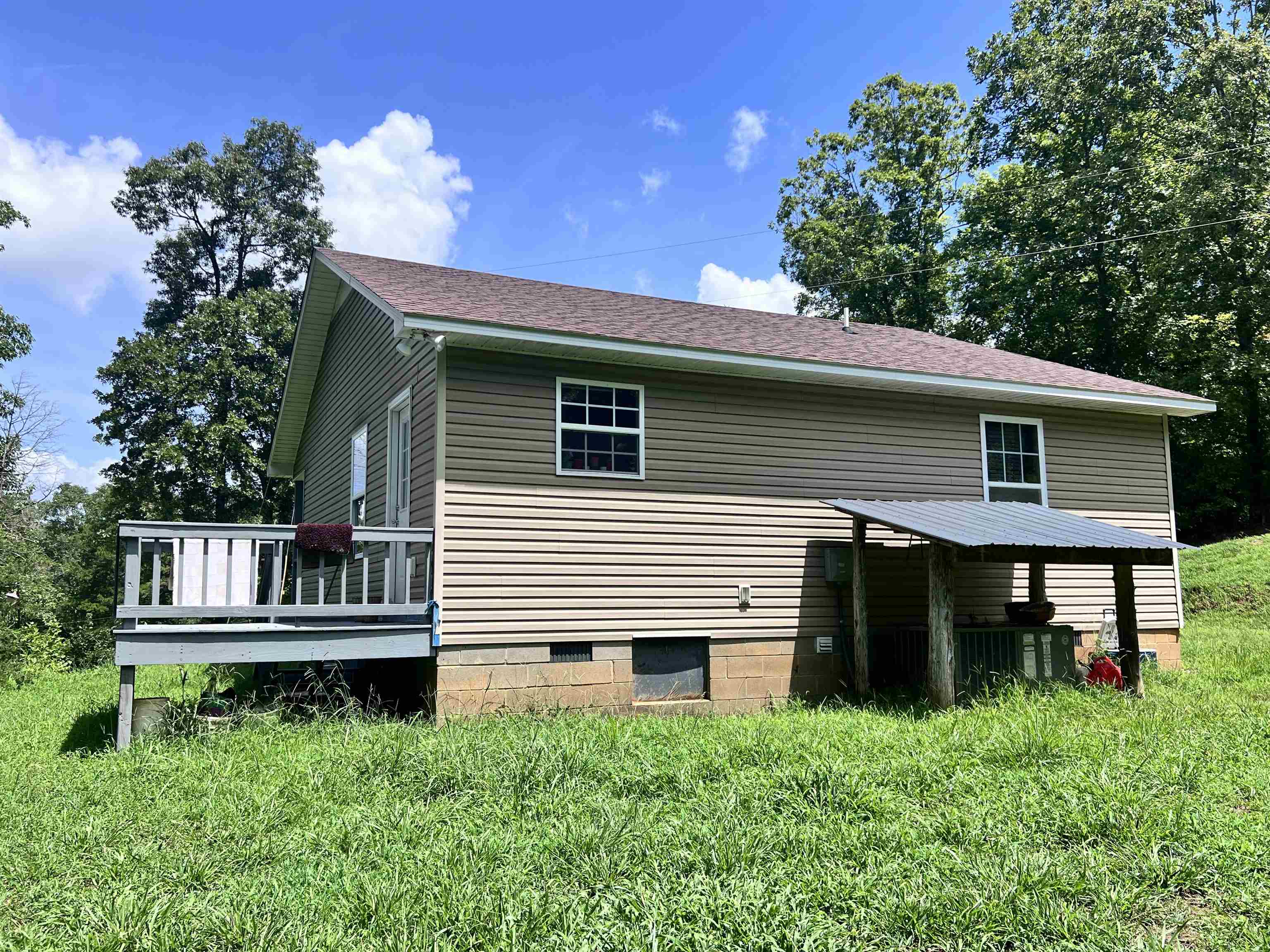 3800 County Home Road Savannah, TN 38372 - Photo 5 of 21 Exterior space with a yard and a wooden deck