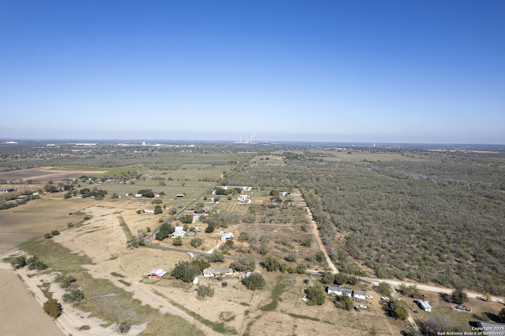 19672 Ballard Road Elmendorf, TX 78112 - Photo 7 of 9 an aerial view of a city