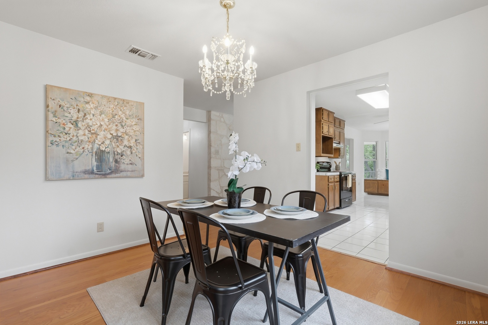 261 Fawn Lane Spring Branch, TX 78070 - Photo 11 of 44 a view of a dining room with furniture and chandelier