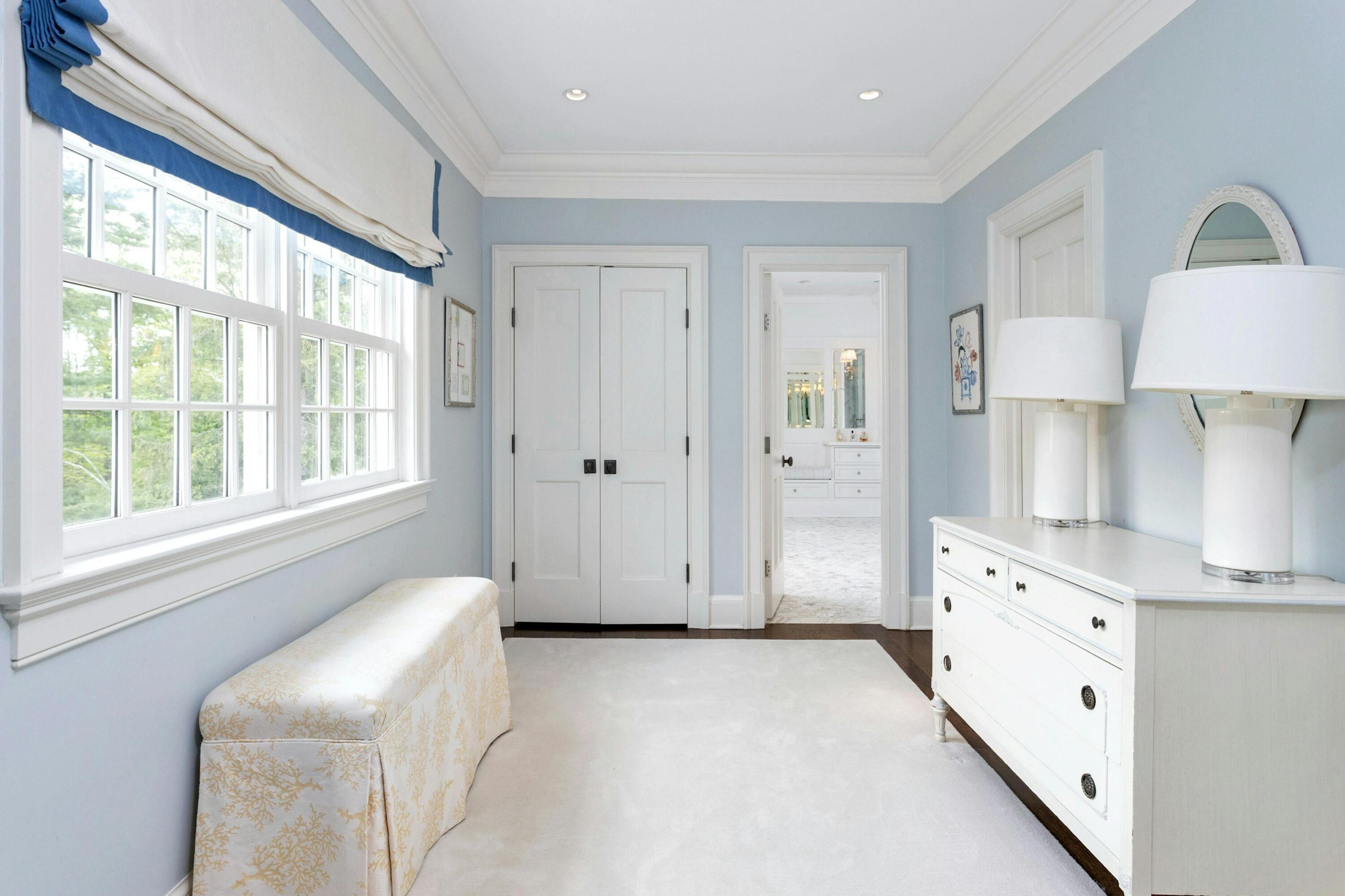 527 Middlesex Road Darien, CT 06820 - Photo 28 of 51 a view of an empty room with cabinet and a window