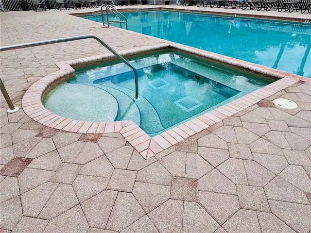 a view of a swimming pool and in the outdoor space