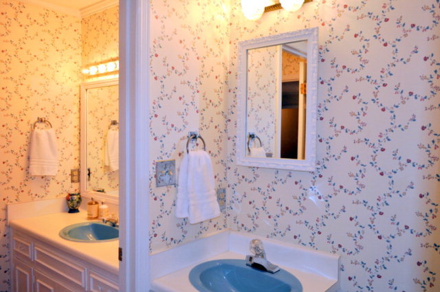 5237 Zebulon Road Macon, GA 31210 - Photo 22 of 33 a bathroom with a sink and a mirror