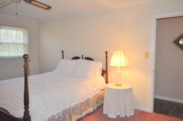 5237 Zebulon Road Macon, GA 31210 - Photo 24 of 33 a bedroom with a bed and a window