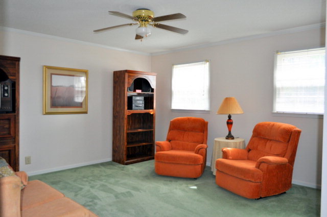 5237 Zebulon Road Macon, GA 31210 - Photo 26 of 33 a living room with furniture and a window