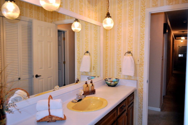 5237 Zebulon Road Macon, GA 31210 - Photo 29 of 33 a bathroom with a sink vanity granite tub and shower
