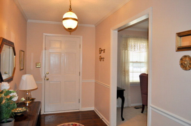 5237 Zebulon Road Macon, GA 31210 - Photo 6 of 33 a view of entryway with wooden floor and furniture