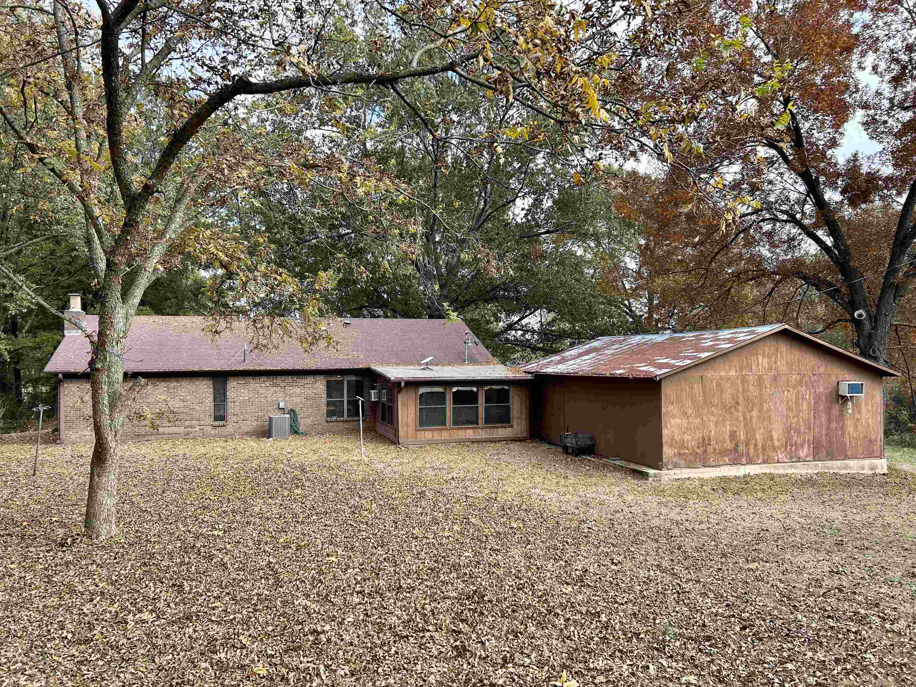 3975 Billion Road Memphis, TN 38127 - Photo 9 of 9 Rear view of house featuring view of scattered trees